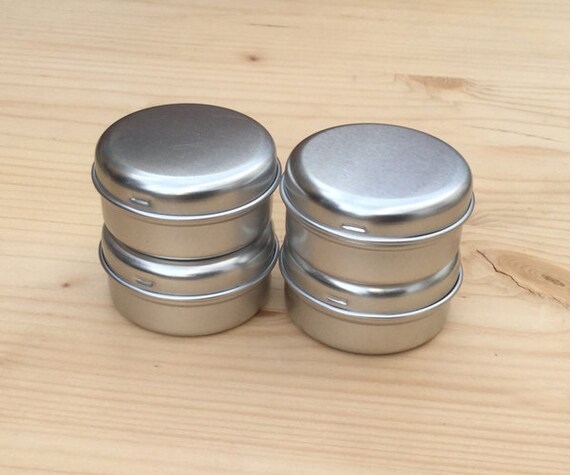 Download round metal tins 15ml tin box in silver color lip balm box Yellowimages Mockups