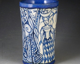 Blue and white one of a kind ceramic story vase