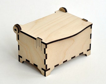 Wooden small box with sliding bolt latch. Laser cut by cartonus