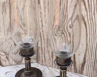 A pair of Antique hurricane type candle holders