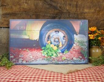 Rusty Truck with Flower at the Wheel Base Wood Slat Pallet Sign..Motivational Inspritational Rustic style country photo