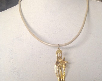 Octopus necklace -gold plated sterling silver on leather rope