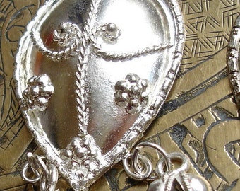 Scarab beetle with bells