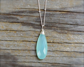 Aqua blue chalcedony necklace. Sterling silver blue chalcedony briolette necklace on a bead chain. Facate chalcedony teardrop pendant.
