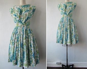 1950s party dress | vintage 50s dress | 1950s floral day dress | flower print dress | blue green and white | small | The Chesterfield Dress