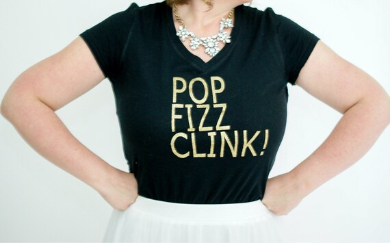 pop fizz click black and gold graphic shirt