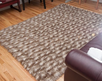 Long pile faux fur rug