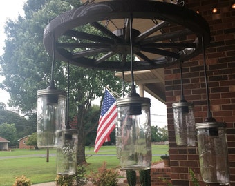 Wagon wheel mason jar chandelier