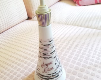 Milk glass Jergen's Lotion bottle with pump top gold and black design makes vintage made in the US