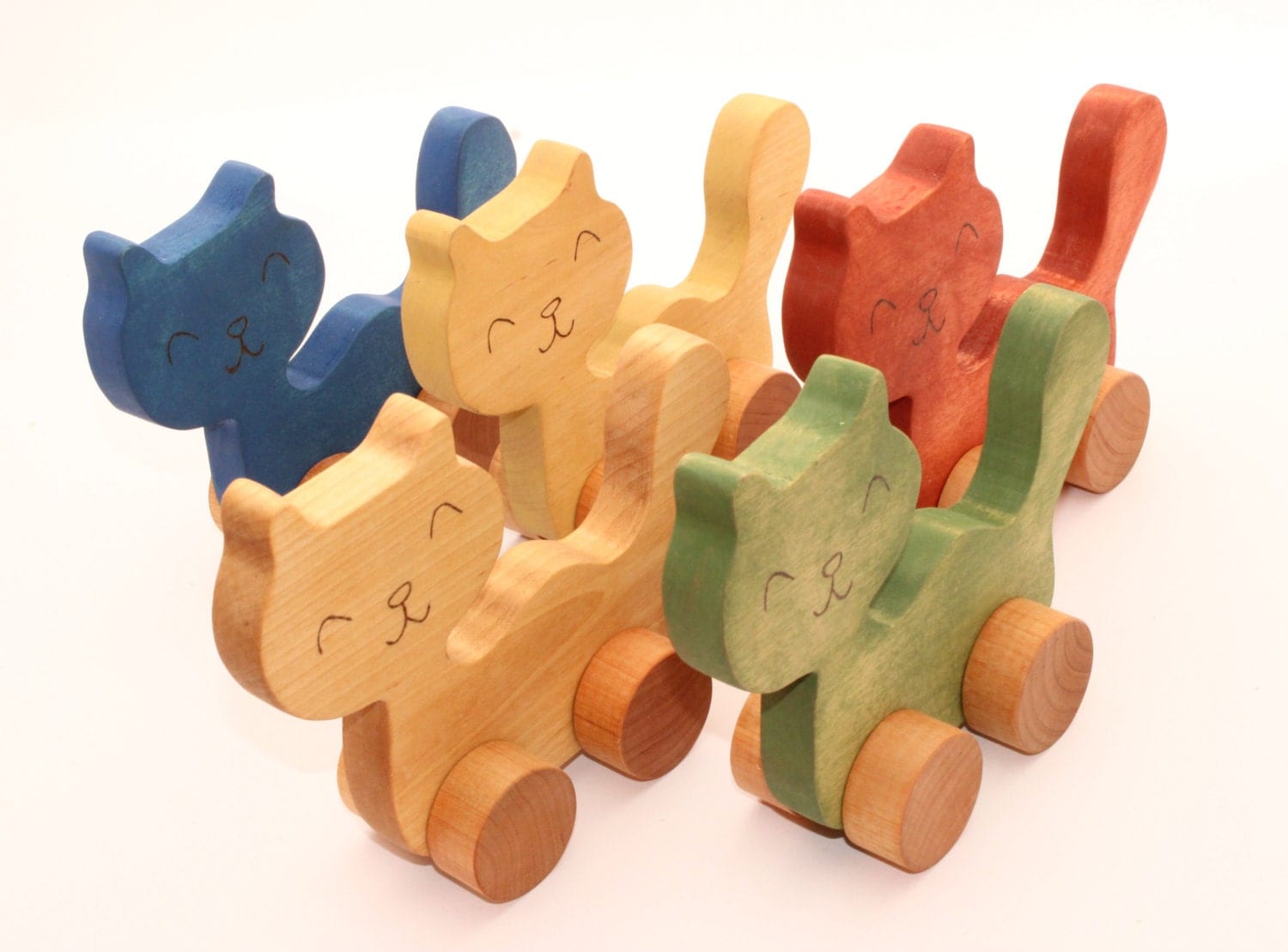 Wooden toy cat on wheels. Animal toy. Gift. Boy. Girl. Gift