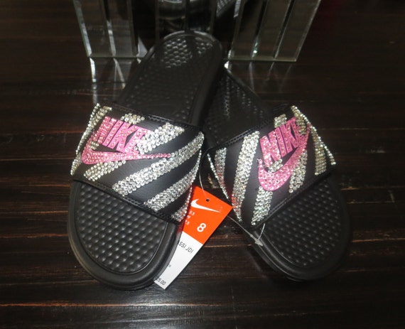 pink nike flip flops