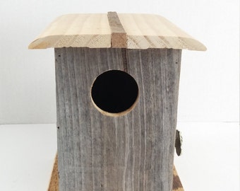 Rustic hand crafted bird house raw wood greay wood