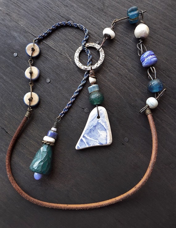 Euphonia. Artisan lariat necklace with vintage beads and sea pottery in blue, green, and white. Mixed media jewelry.