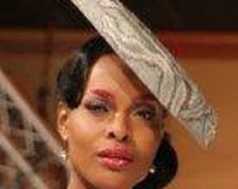 Design Ronald Kolk Haute couture made by me sinamay grey silvery sequined saucer hat on comb