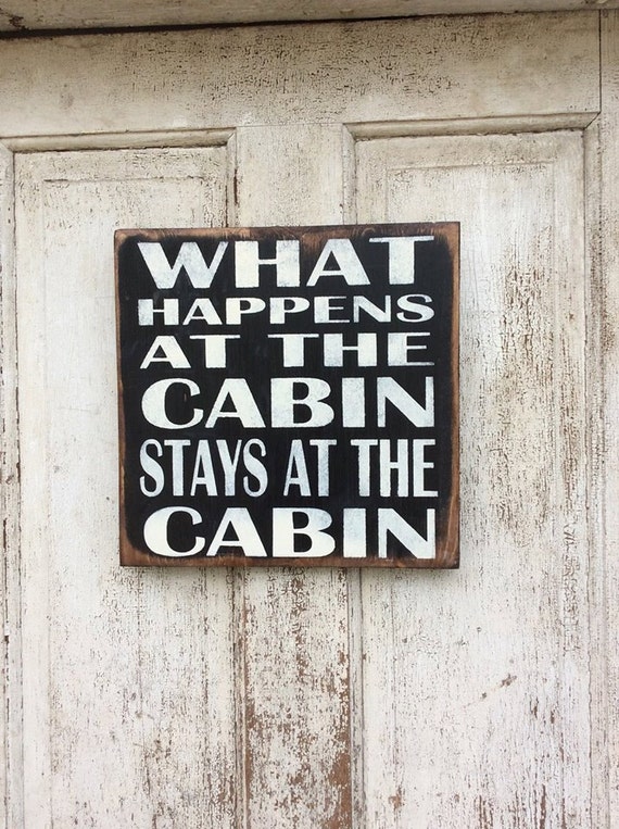 items-similar-to-what-happens-at-the-cabin-stays-in-the-cabin-wood-sign