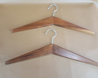 Pair of mid century minimalist walnut hangers