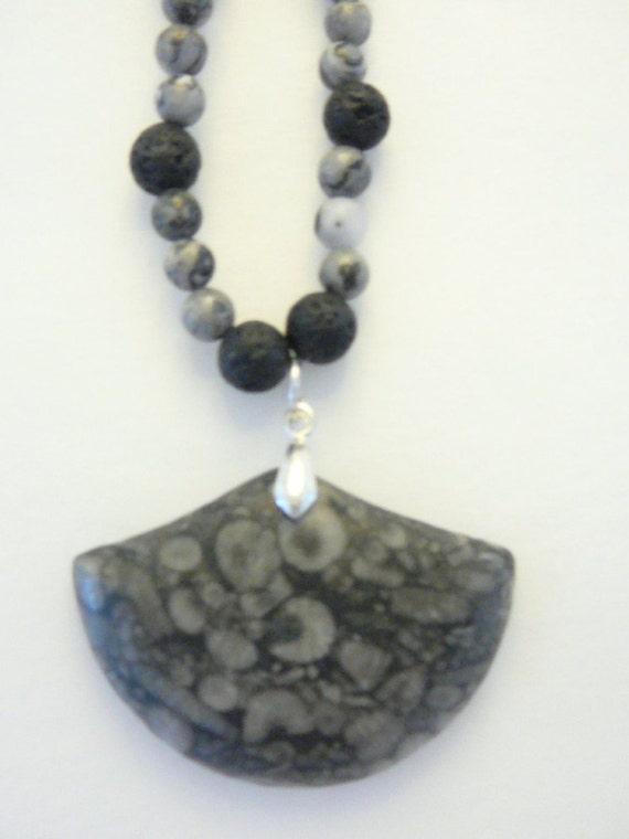 Fan Shaped Fossil Pendant on Natural by BlackVelvetTreasures