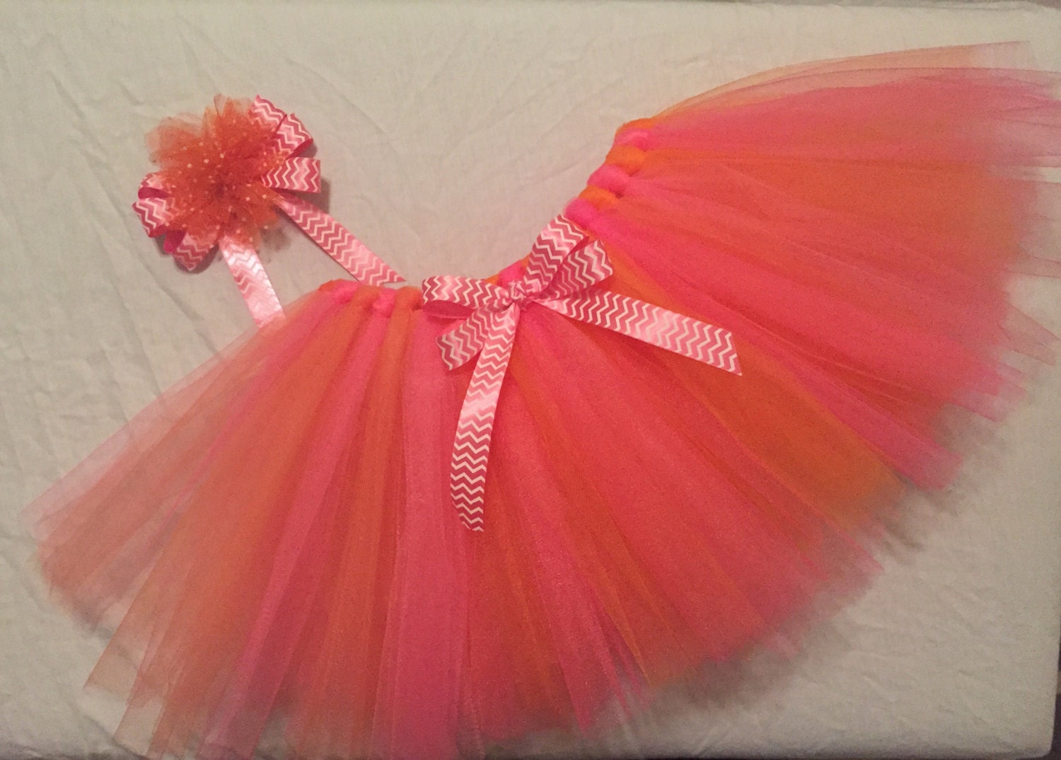 Pink and orange single layer tutu with elastic waist band and