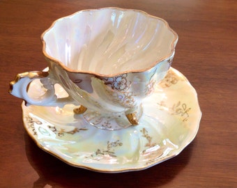 Lustre ware teacup and saucer