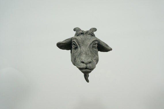 cement goat statue