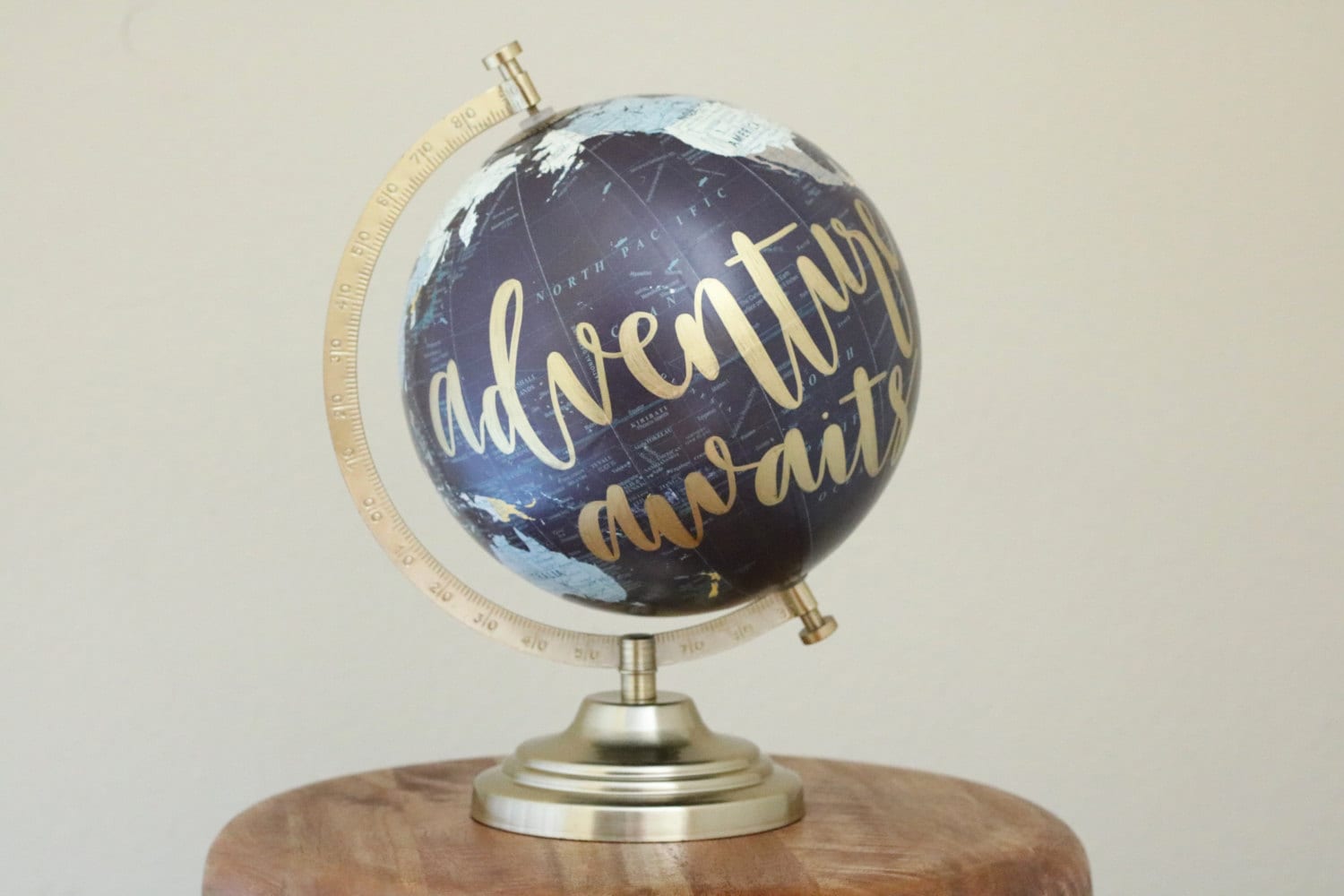 hand lettered calligraphy globe // adventure awaits