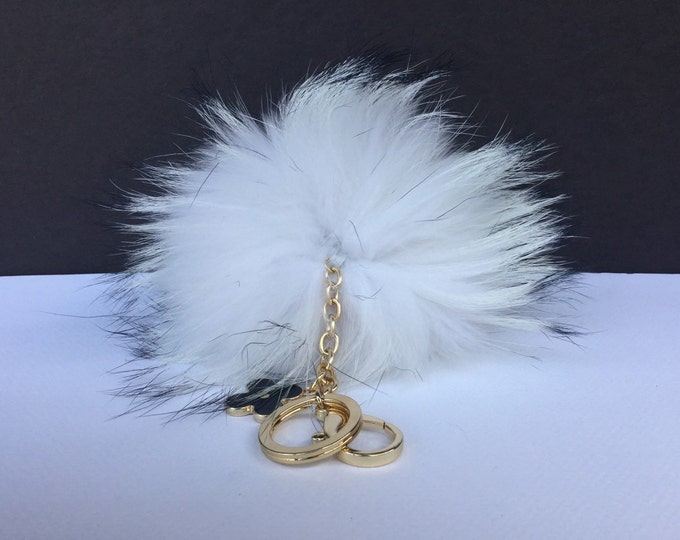Snow white with natural markings Raccoon Fur Pom Pom luxury bag pendant + black flower clover charm keychain