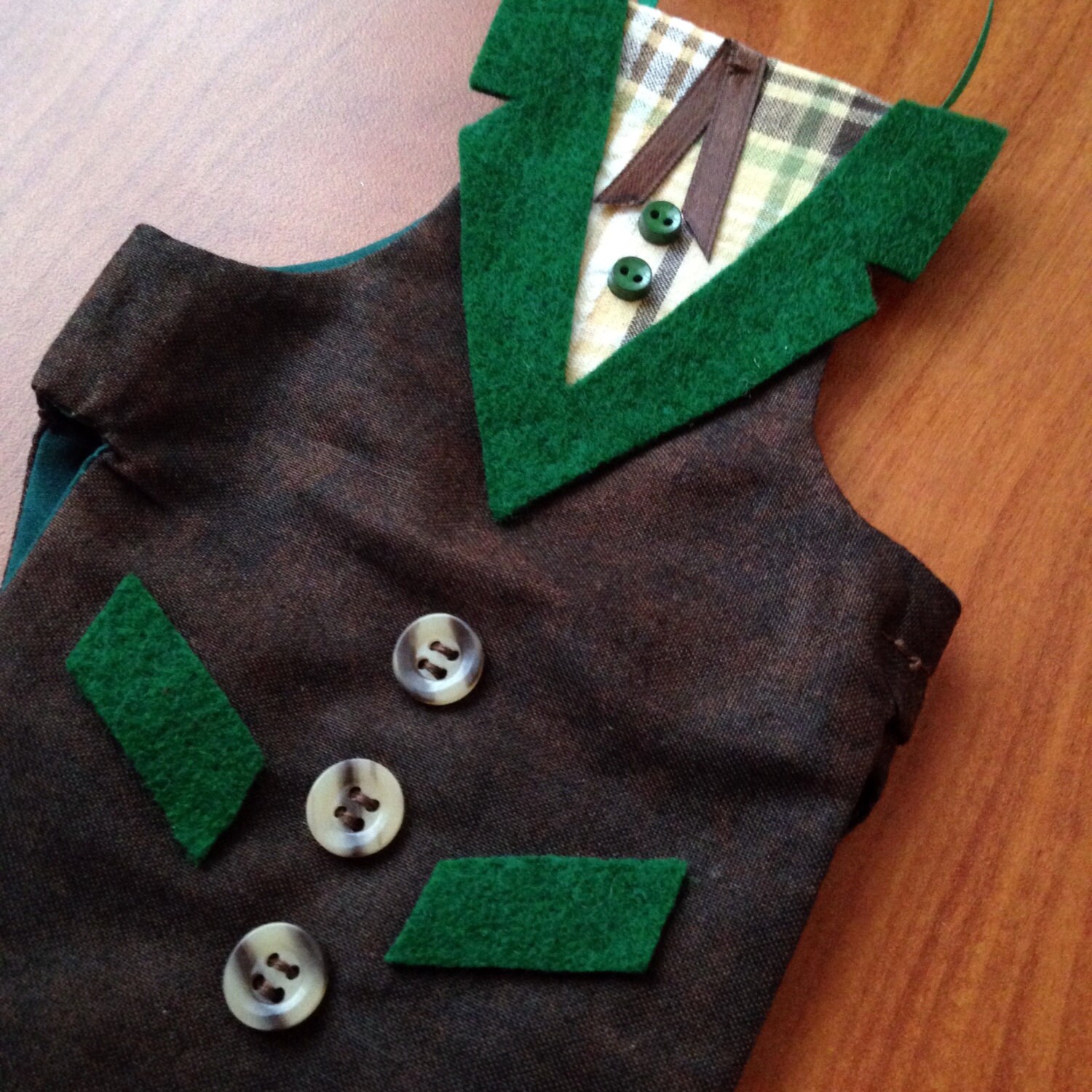Wine bottle suit jacket with hunter brown tie and buttons