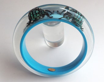 Funky blue lucite bracelet with two exotic real insects