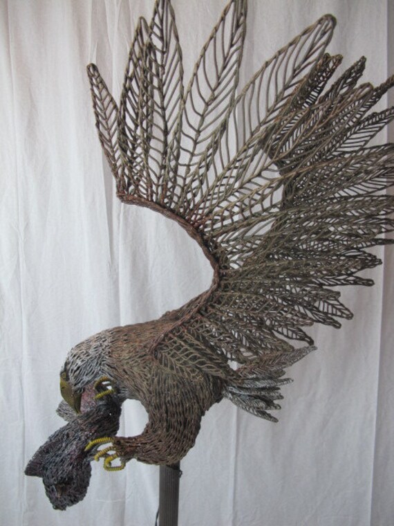 Bald Eagle catching fishmetal sculpture using recycled by Ponyart
