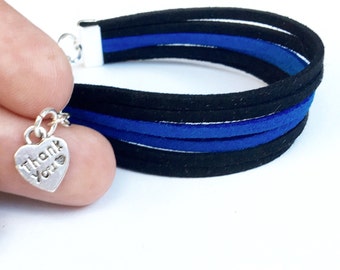 thin blue line bracelet. support police officers, police officers wife, leow. faux suede with a lobster clasp.