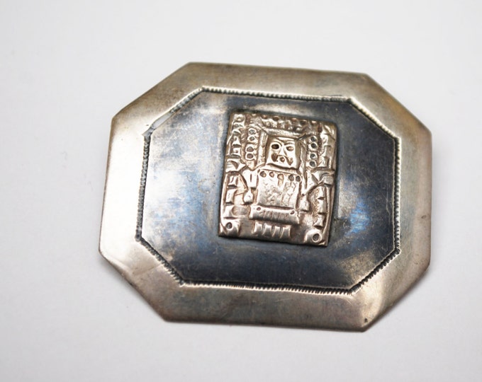 Sterling Brooch - repousse silver tribal Motif - Niello Black enameling - c clasp pin