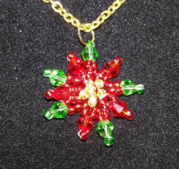 Poinsettia flower beaded Christmas necklace. Gold chain.