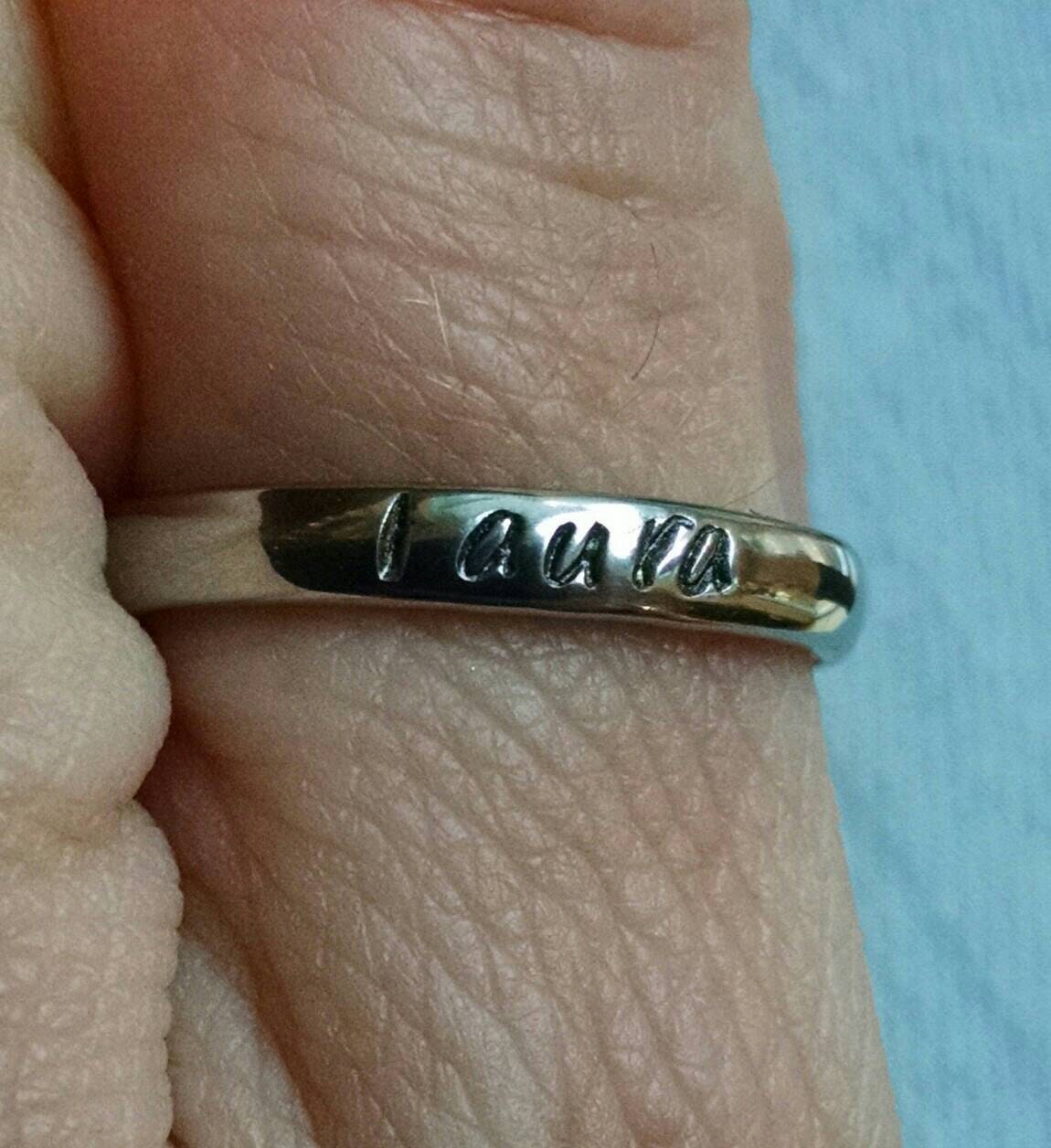 Hand stamped stainless steel stacking name rings by NoTwoTheSame