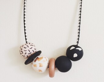 Christie - Handmade Polymer clay Necklace, 6 bead, adjustable brown leather cord
