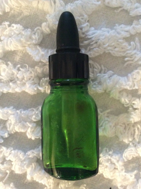 Vintage green medicine bottle