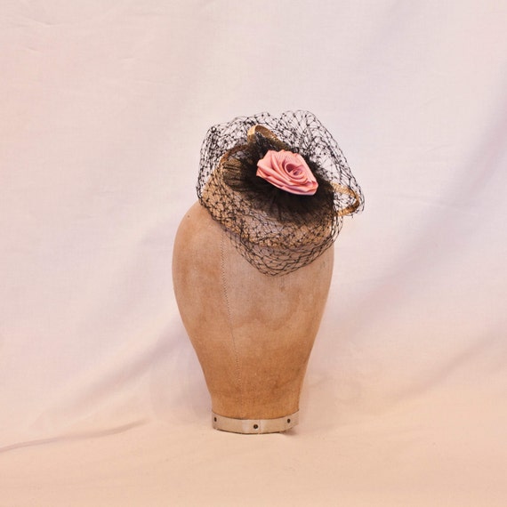 Beautiful ladies occasion straw hat decorated with a handmade pale pink ribbon rose