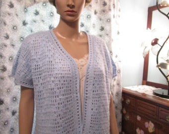 One of a kind crochet ladies light weight summer sweater in blue acrylic baby yarn.