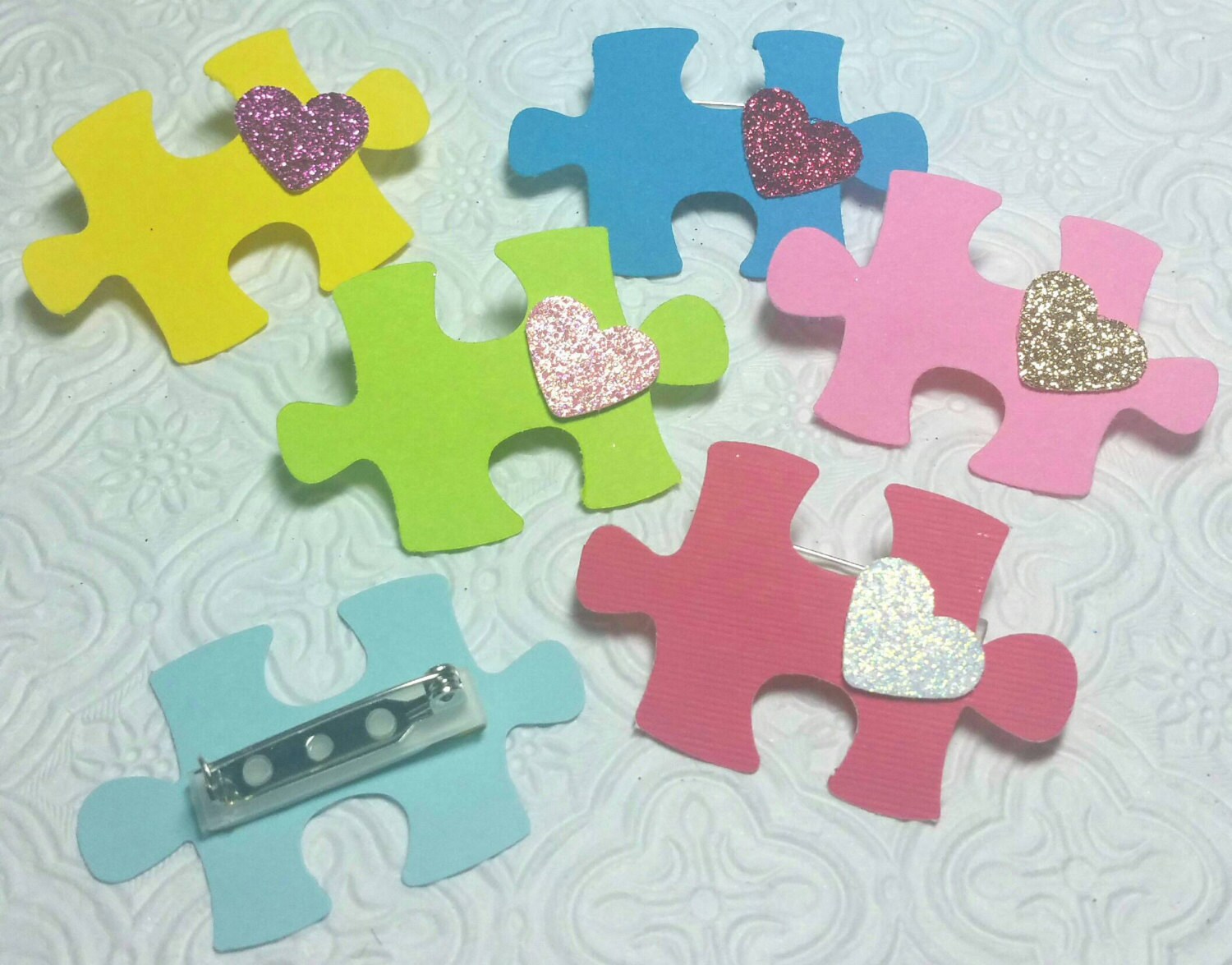 Choose colors Autism Awareness puzzle pieces and hearts love