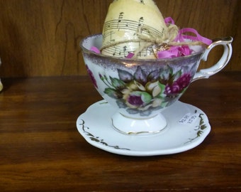 Decoupage egg in tea cup