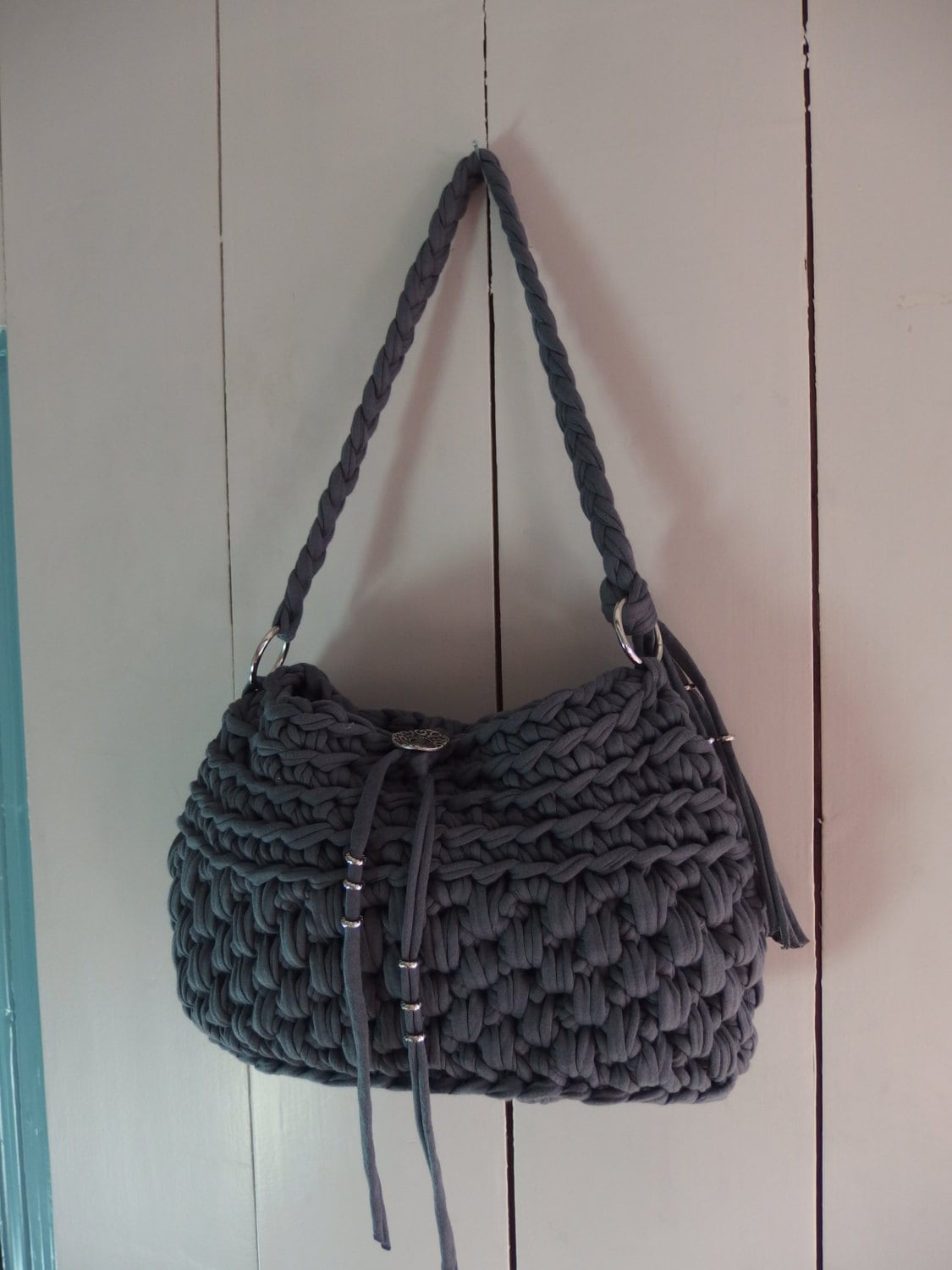 Grey handbag/shoulder bag crochet from t-shirt yarn.
