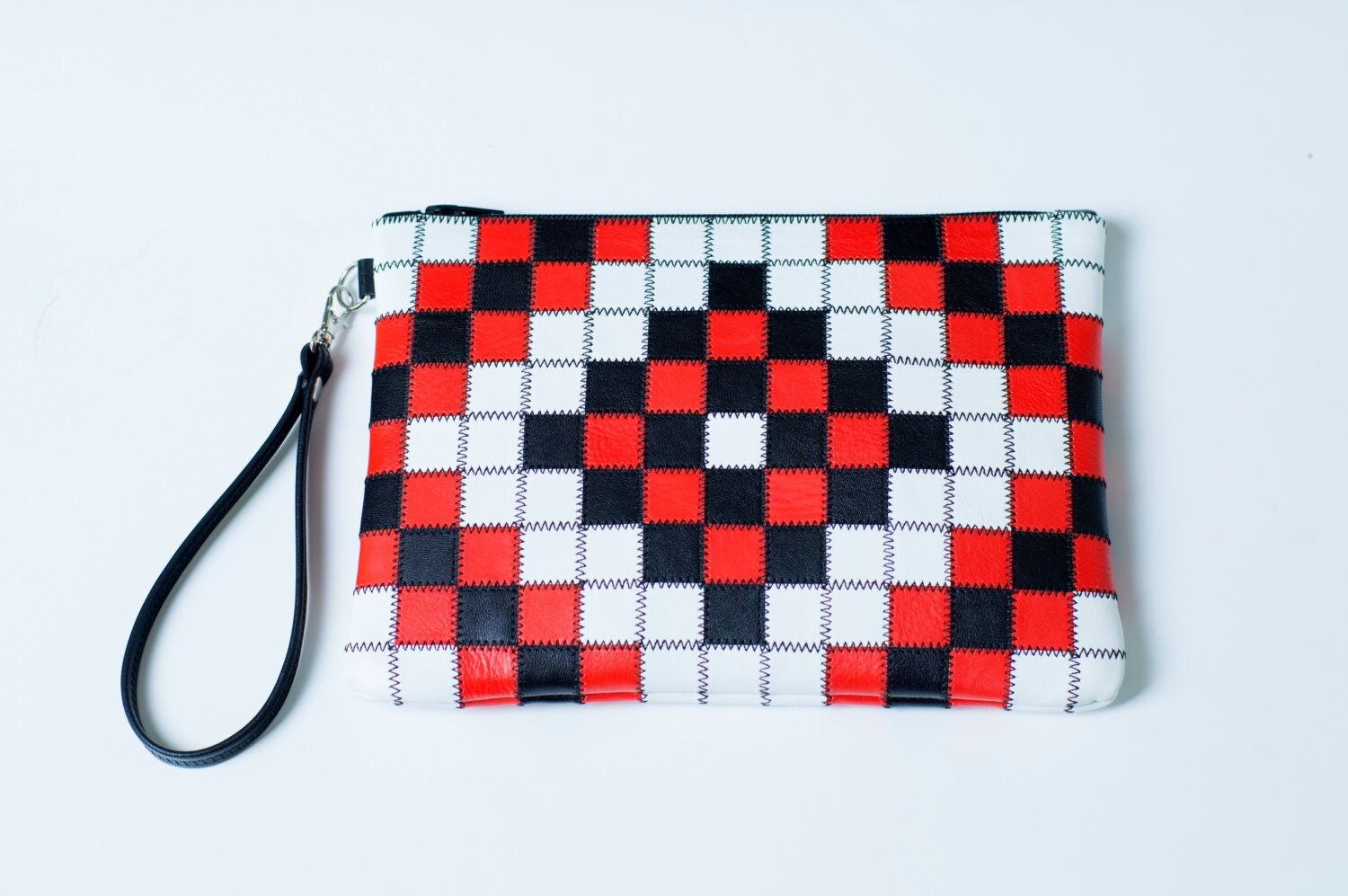 black and white checkered clutch