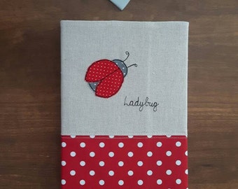 A5 fabric covered notebook / journal/diary/planner cover using free motion embroidery with Ladybug applique, diary, sketchbook