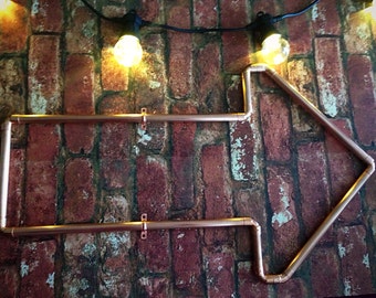 Arrow signage, copper, bars, restaurants, clubs, cafes, home