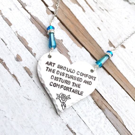 Hand stamped art should comfort the disturbed and disturb the