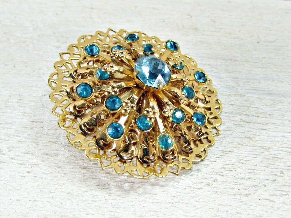 Vintage Blue Rhinestone Brooch Pin Designer CORO Gold Atomic