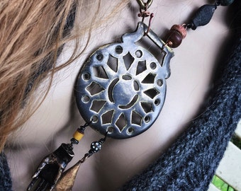 Tribal assemblage necklace with large brass focal and brass hand, rustic tribal beads, artisan necklace, statement necklace