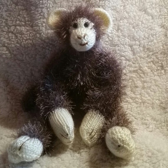 monkey stuffed animal with banana