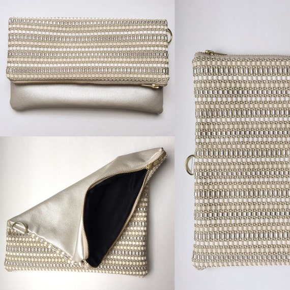 silver and white clutch