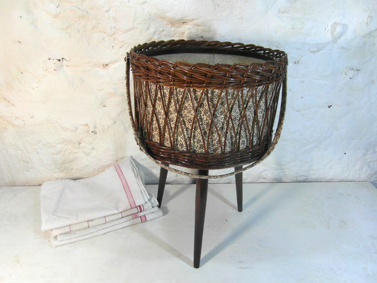 Wicker basket on tripod legs knitting basket sewing basket