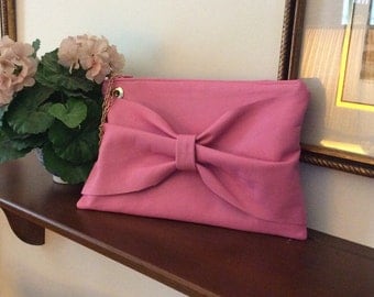 Pink Leather Clutch Handbag with Bow